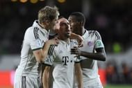 AGADIR, MOROCCO - DECEMBER 17: FC Bayern Munichs Franck Ribery (C) celebrates with his teammates Toni Kroos (L) and David Alaba (R) after scoring a goal during the FIFA Club World Cup 2013 soccer match between FC Bayern Munich and Guangzhou Evergrande FC on December 2013 in Agadir, Morocco. (Photo by Mohamed Hossam/Anadolu Agency/Getty Images)
